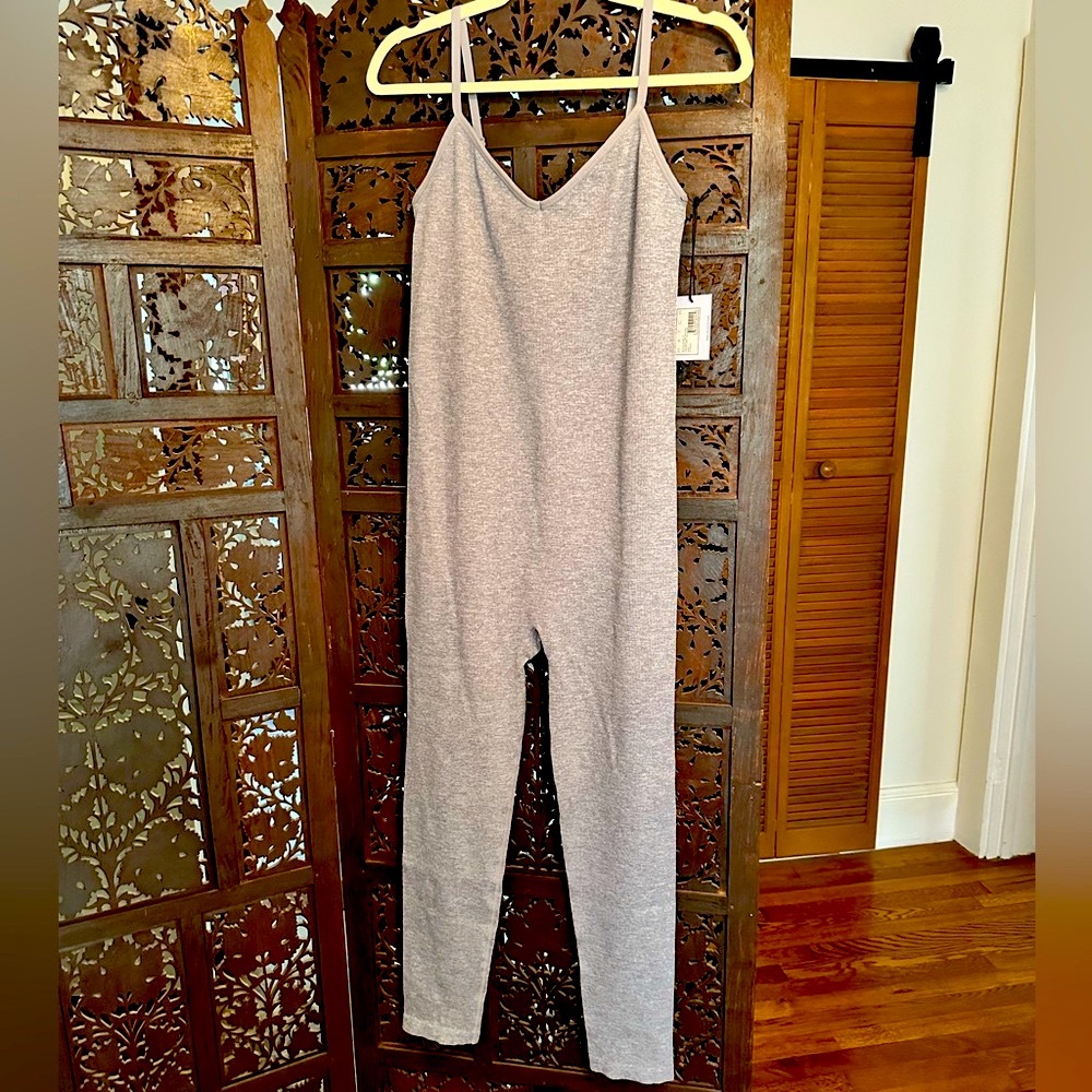 Hatch Body ribbed Unitard. NWT never worn. Grey color. Size L